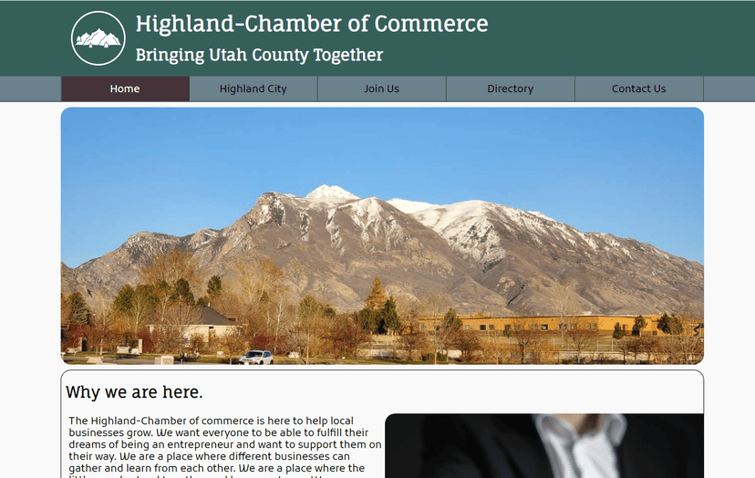 A screenshot of a website featuring a mountain residing over a small city